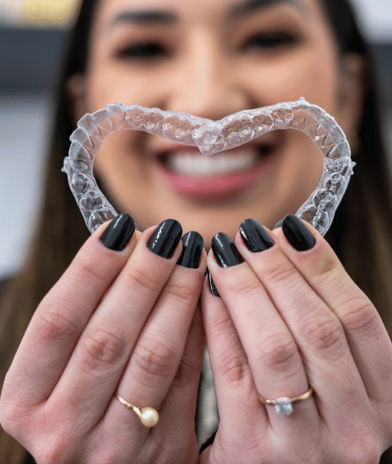 invisalign alternative clear braces being proudly shown off